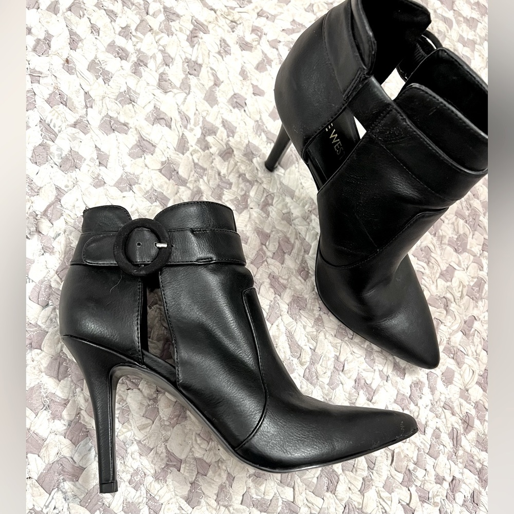 Nine West ankle bootie with 4 inch heel.  Black leather.  Size 7.5